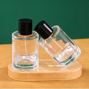 Flacon de <span class=keywords><strong>parfum</strong></span> en verre transparent de 100 ml, design cylindrique, avec bouchon noir, prix fabricant bas - Product Image 2