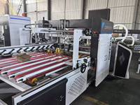 Machine automatique de pliage et de collage de cartons en papier ondulé pour l'emballage industriel QZD