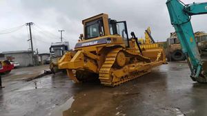 รถดันดินตีนตะขาบ Caterpillar D6H มือสอง พร้อมใบมีด Root Rake สำหรับงานก่อสร้างและเหมืองแร่ มีสินค้าในสต็อก - Product Image 4