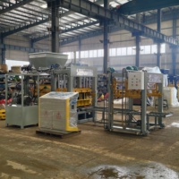 Machine automatique de formage de briques QT4-15 pour la production de blocs de pavage routier