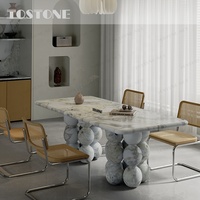 Table à manger contemporaine en marbre gris naturel Tostone, finition personnalisée, base en pierre pour projets résidentiels et d'intérieur