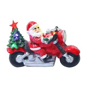 Adornos de Ambiente Navideño con Luces LED de Colores y Música: Santa Claus Conduciendo una Motocicleta en una Escena Nevada - Product Image 1