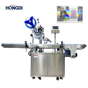 Machine d'étiquetage automatique pour surfaces planes, pour bouteilles, bouchons, boîtes et contenants - Product Image 1