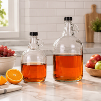 Bouteille en verre transparente de qualité alimentaire avec poignée en forme de boucle et bouchon à vis pour les bouteilles de vin rouge fait maison