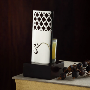 Porte-bougie Om élégant finition argentée, support de bougie spirituel pour la méditation, la décoration de salle de prière, les cadeaux festifs et la maison - Product Image 1