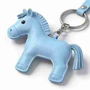 سلسلة مفاتيح من جلد الحصان المجنون على شكل كرتوني بسيط من الجلد الطبيعي - Product Image 1