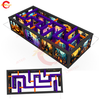Amusement interactif d'Halloween: maison hantée gonflable de 9x4m avec jeu de puzzle et souffleur d'arène de labyrinthe pour la fête des enfants