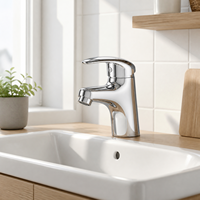Robinet mitigeur de lavabo monocommande chromé, à poser sur comptoir, corps arrondi et épuré, bec intégré courbé, aérateur économiseur d'eau