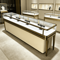 Meubles de vitrine pour bijouterie, table de présentation de luxe en or, idées de design d'intérieur pour bijouterie, vitrine pour bijouterie en or