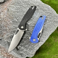 Usine en gros Tunafire Anti Skip fendu bleu G10 poignée couteau pliant pierre lavé 14C28N acier EDC Camping couteau de poche