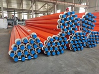 Tuyau en acier isolé thermiquement avec gaine en HDPE orange, âme en mousse PU, design moderne, certifié CE, durée de vie prolongée pour l'alimentation en eau chaude