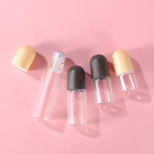 2024 Offre Spéciale 1ml2ml3ml <span class=keywords><strong>Grain</strong></span> <span class=keywords><strong>de</strong></span> <span class=keywords><strong>bois</strong></span> couverture rouleau bouteille pack d'essai <span class=keywords><strong>parfum</strong></span> huile essentielle petite sous-bouteille petite bouteille à rouleau - Product Image 3