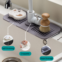 Tapis anti-goutte de vente chaude pour la cuisine arrêter l'eau mise en commun porte-éponge de savon Silicone évier Splash Guard