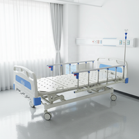 Lit médical manuel OEM à trois fonctions, lit de soins réglable à 3 manivelles pour hôpitaux et centres de réadaptation