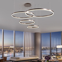 Luminaire suspendu LED rond minimaliste et créatif pour salon, salle à manger, hôtel, villa, lustre circulaire, luminaire de plafond
