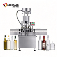 Machine de bouchage automatique compacte à tête unique pour huile d'olive, idéale pour les lignes d'embouteillage de petite et moyenne taille
