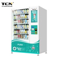 TCN Robotique Intelligent D'écran Tactile de 24 Heures de Service D'individu Pharmacie Distributeur Automatique de Médicaments et Masque
