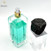 Desain Khusus pada Bagian Bawah Botol Parfum Kaca 50ml Kemasan Kosmetik Berkualitas Tinggi Leher Crimp Tersedia dalam Stok dengan Tutup Batu