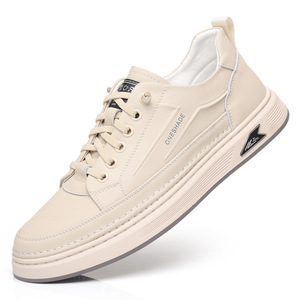 รองเท้าผ้าใบลำลองผู้ชายสีขาว ส้นเตี้ย ระบายอากาศได้ดี พื้นยาง เหมาะสำหรับเดินเล่นสบายๆ - Product Image 5