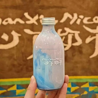 Bouteille ronde en verre de qualité alimentaire de 300ml 350ml 500ml pour jus eau café boisson liqueur thé lait bouteille en verre avec bouchon à vis