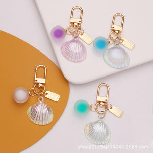 Nouvelle couleur plaquée Imitation coquille voiture porte-clés pendentif unisexe étui pour écouteurs décoration couleur boule accessoires - Product Image 1