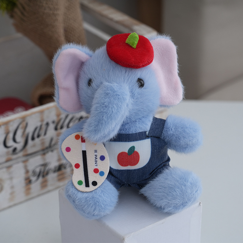 Un carino peluche di elefante interattivo che canta, bambolotto
