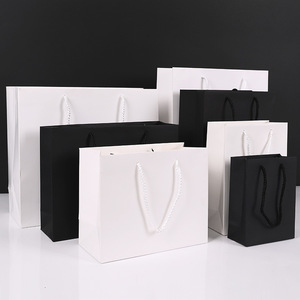 Wholesale Custom Luxury Paper <b>Bags</b> with Hot Stamping Ribbon Handles Recycled Materials for Gift & Clothing - Product Image 2