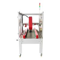 Machine d'emballage de boîtes en carton semi-automatique FX-AT5050, petite, pour le ruban adhésif