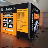 Stand d'exposition personnalisé avec boîte lumineuse publicitaire, système modulaire 10x20 pieds, double comptoir d'accueil, stand d'exposition personnalisé