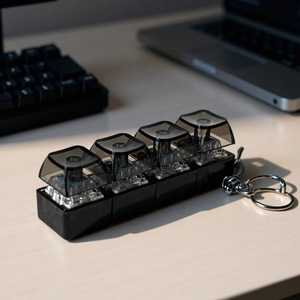 Juguete Antiestrés con Interruptor de Teclado Mecánico y Clic Satisfactorio, Llavero de Teclado Luminoso 4 en 1, Clicker de Dedo para Aliviar el Estrés - Product Image 1