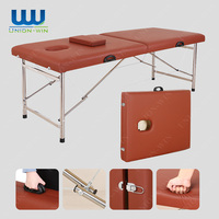 Union Win Camillas Lit de salon de beauté Table de massage pliable en cuir PU pour patient en métal et acier inoxydable