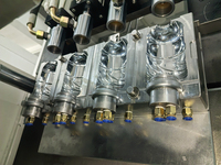 Machine de soufflage de bouteilles PET semi-automatique à 4 cavités, adaptée aux bouteilles d'eau