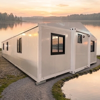 Maison conteneur moderne extensible de 40 pieds avec cadre noir et jaune désert, caractéristiques coupe-vent et étanches, idéale pour usage hôtelier
