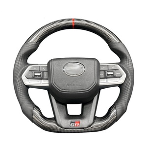 พวงมาลัยคาร์บอนไฟเบอร์สมรรถนะสูงสำหรับ Toyota LC300 Alphard 80 Series Hilux Land Cruiser Crown อะไหล่รถยนต์ขายส่ง - Product Image 1
