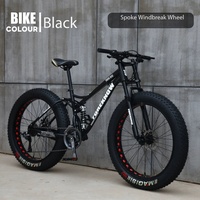 VTT à pneus larges avec roues à cinq branches intégrées résistantes aux chocs, transmission 21 vitesses et fourche à suspension pour le sable, la neige et les voyages sur route.
