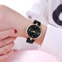 Montre à quartz pour femme avec cadran rond, bracelet en métal, marqueurs décoratifs en cristal, montre-bracelet analogique minimaliste pour un usage quotidien
