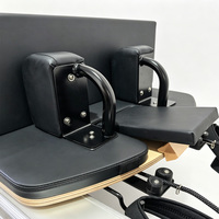 Machine de Pilates professionnelle MHL, structure en alliage d'aluminium, système de rétraction automatique des cordes, pour usage en studio.