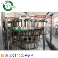 Machine de remplissage de boissons gazeuses, de vin moussant et de soda en bouteille en plastique PET 3 en 1 monobloc 3000bph avec commande PLC