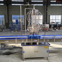Machine de remplissage de liquide de bouteille entièrement automatique Machine d'embouteillage de vin de whisky Machine de remplissage de vin de liqueur de vodka de spiritueux