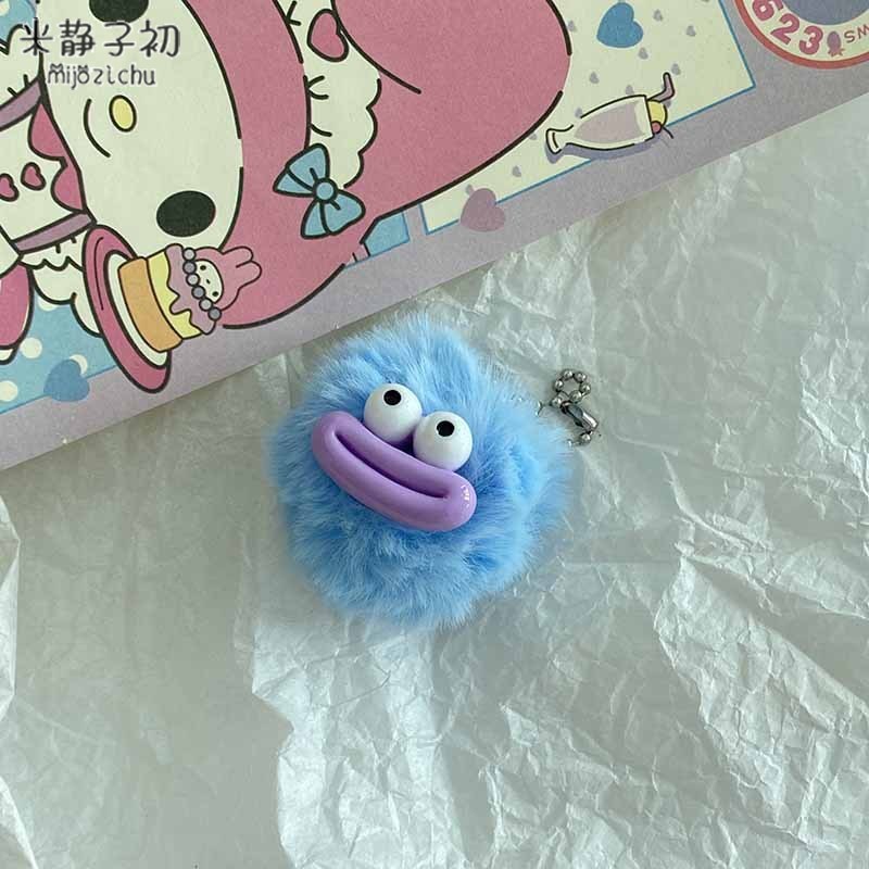 Porte-clés pompon bouche de saucisse turquoise