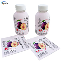 Étiquette d'emballage rétractable brillante nacrée à impression personnalisée pour bouteille de 300ml 550ml 750ml étiquette de manchon rétractable pour boissons