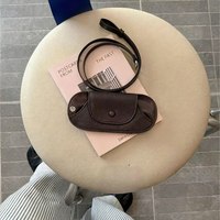 Porte-clés tendance en cuir véritable, design minimaliste à suspendre au cou, pochette multifonctionnelle pour clés, portefeuille pour les voyages en plein air