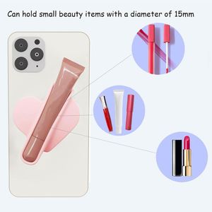 Cute Heart Shape Silicone Lipstick Holder with Portable Strong Adhesive Sticky Back Universal Cell Phone Cosmetic Organizer - Product Image 3