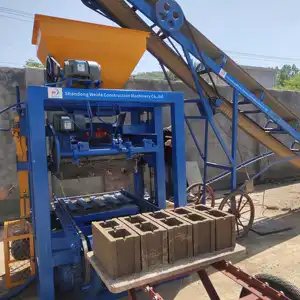 Máquinas de fabricación de bloques de China en Alemania, fábrica de maquinaria de fabricación de ladrillos de bloques de color de cemento de hormigón completamente automática