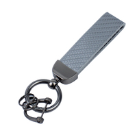 Porte-clés de voiture en cuir personnalisé de luxe, design en fibre de carbone, écologique, rectangulaire, gaufré, de haute qualité, cadeaux d'entreprise