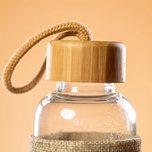 Ecologische herbruikbare borosilicaat glazen waterfles, BPA-vrij, met bamboe deksel en jute hoesje - Product Image 5