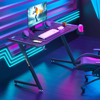 Bureau de jeu PC en bois en forme de Z Wquantum avec porte-gobelet, crochet pour casque, surface en mélamine, assemblage requis pour une utilisation à domicile
