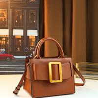 Tas persegi kecil gaya retro Hong Kong wanita versi Korea baru mode musim semi dan musim panas tas tangan gesper persegi warna solid.