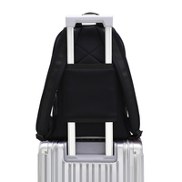 Sac à dos de sport pour femme en néoprène noir personnalisé avec doublure en nylon imperméable, fermeture éclair, caractéristiques durables pour les voyages et l'usage quotidien