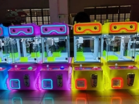 Vente en gros usine : Mini machine à poupées à monnayeur, en métal, sans fil, version anglaise, pour aires de jeux pour enfants et équipement de parc d'attractions